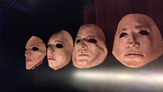 The iconic 'faceless' masks from The Wall era
