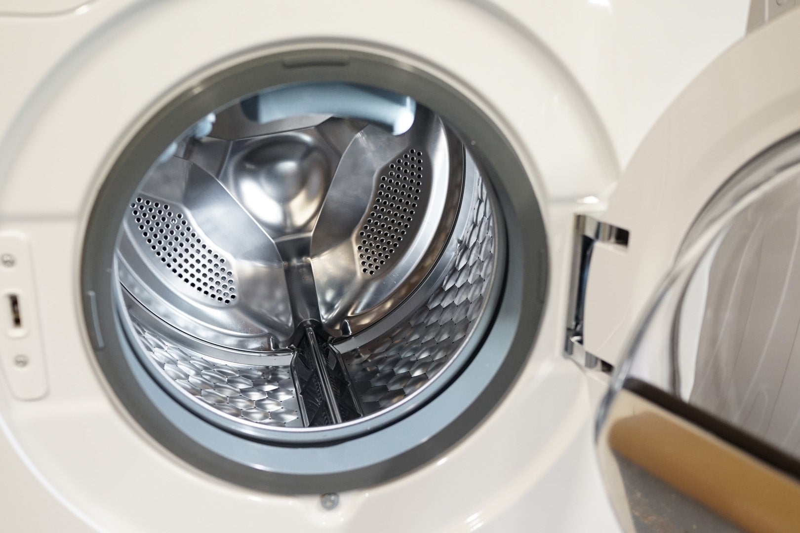 Close-up view inside Miele WTH120 washer-dryer drum.