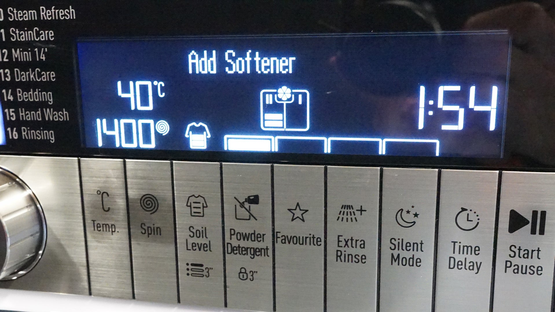 Grundig washing machine control panel and digital display.