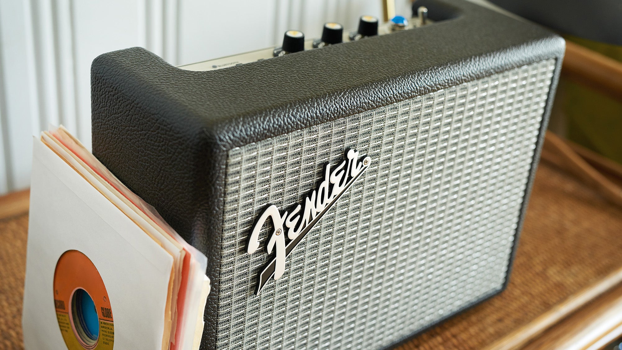 Fender Monterey Bluetooth speaker with records on side.