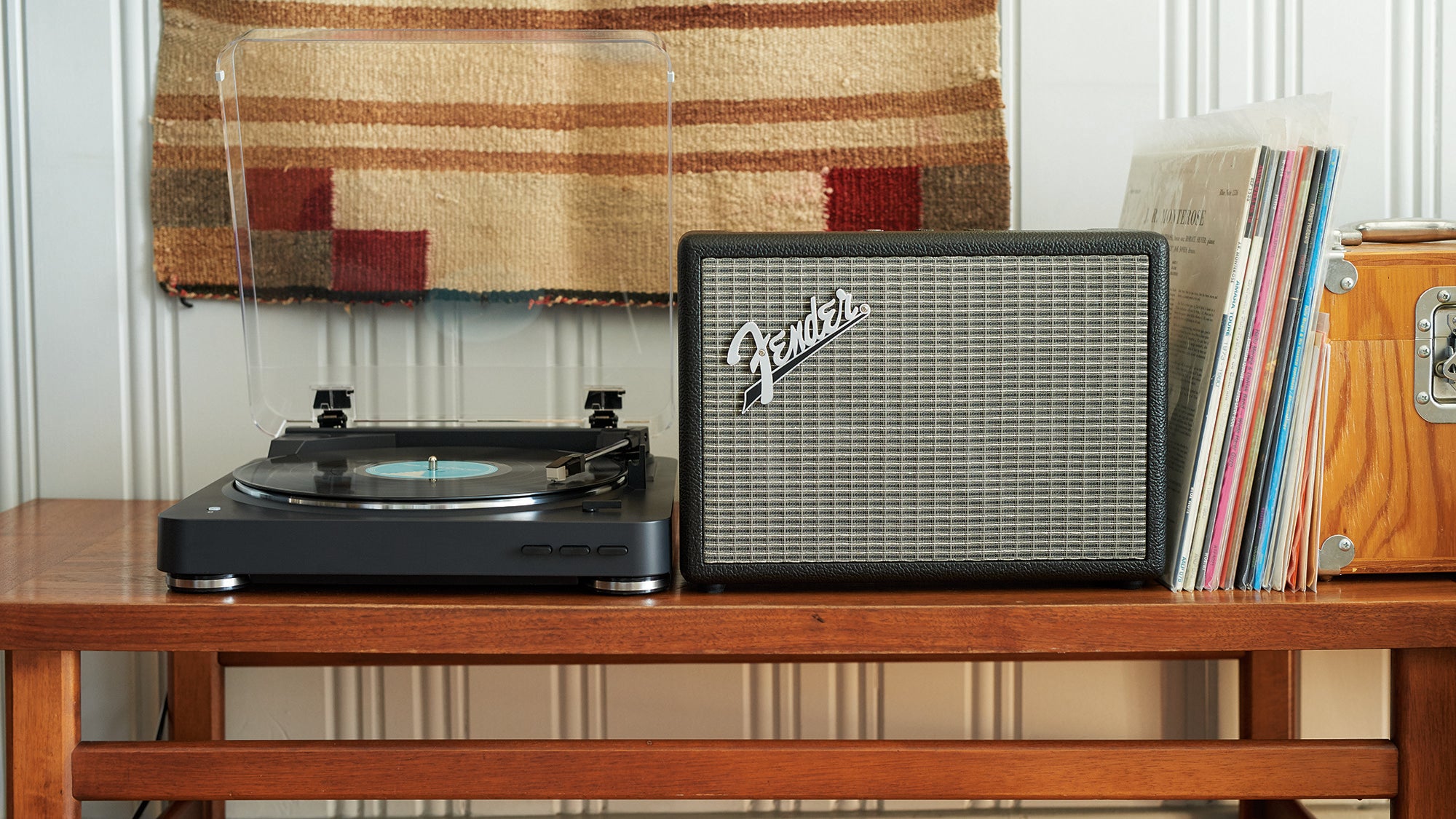 Fender Monterey Bluetooth speaker on wooden table with turntable.
