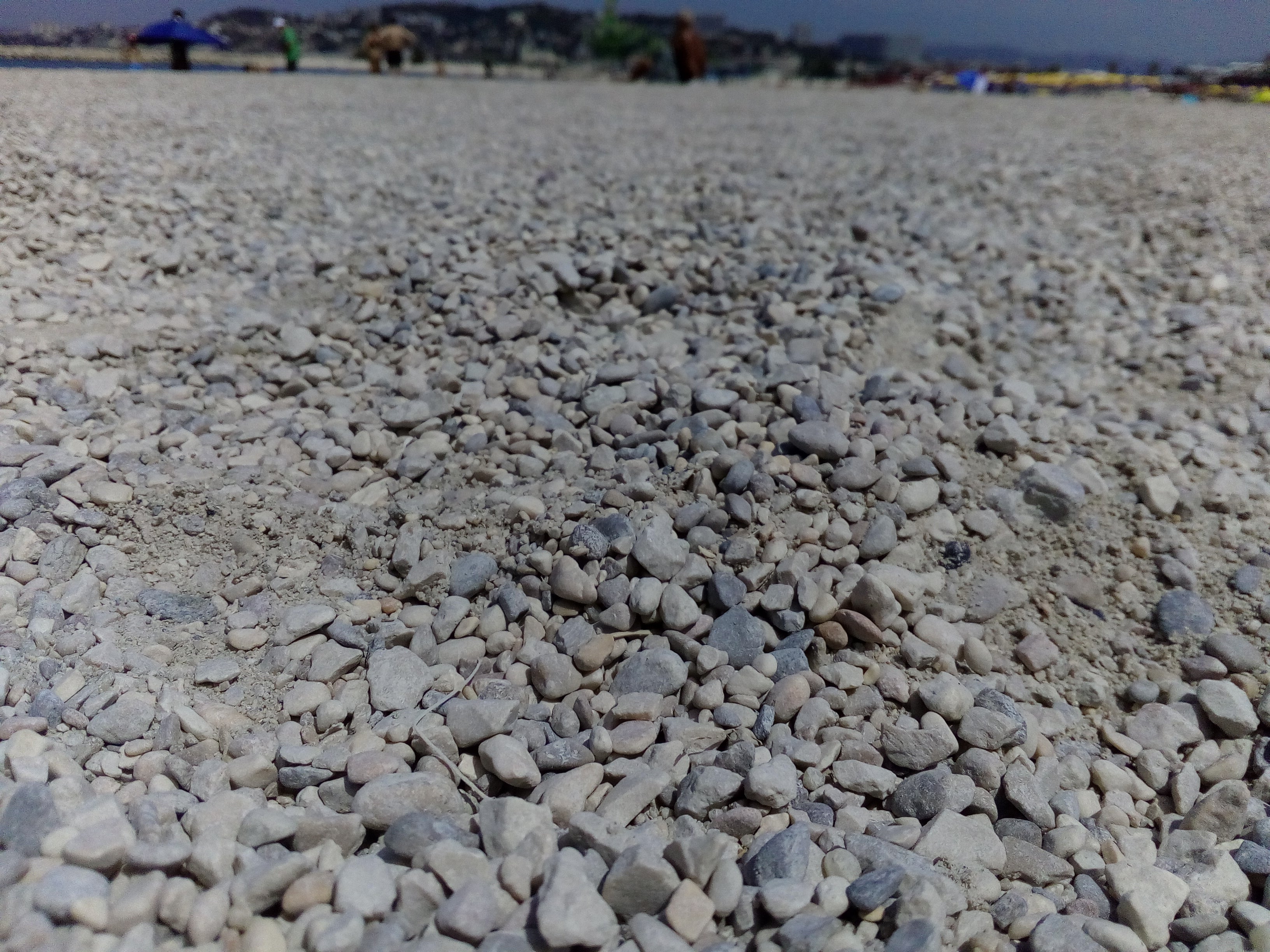 Close-up photo of gravel taken by a camera under review.