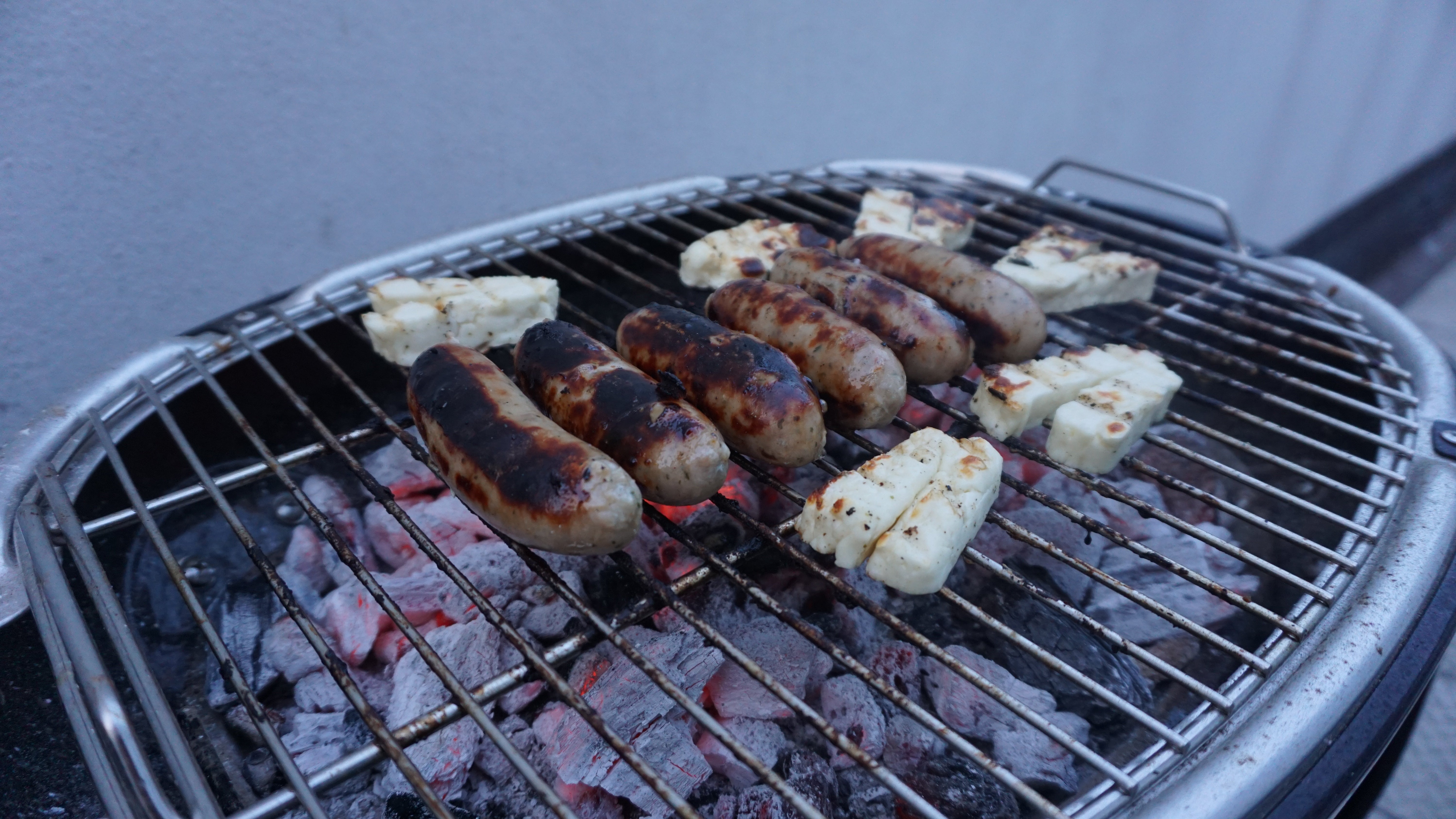 Grilled sausages and cheese on IKEA LILLÖN BBQ grill.