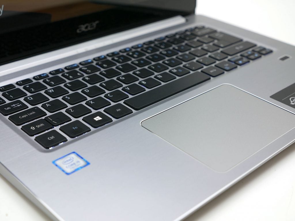 Close-up of Acer Swift 3 laptop keyboard and touchpad.