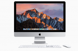 iMac 21.5-inch 4K display with keyboard and mouse.