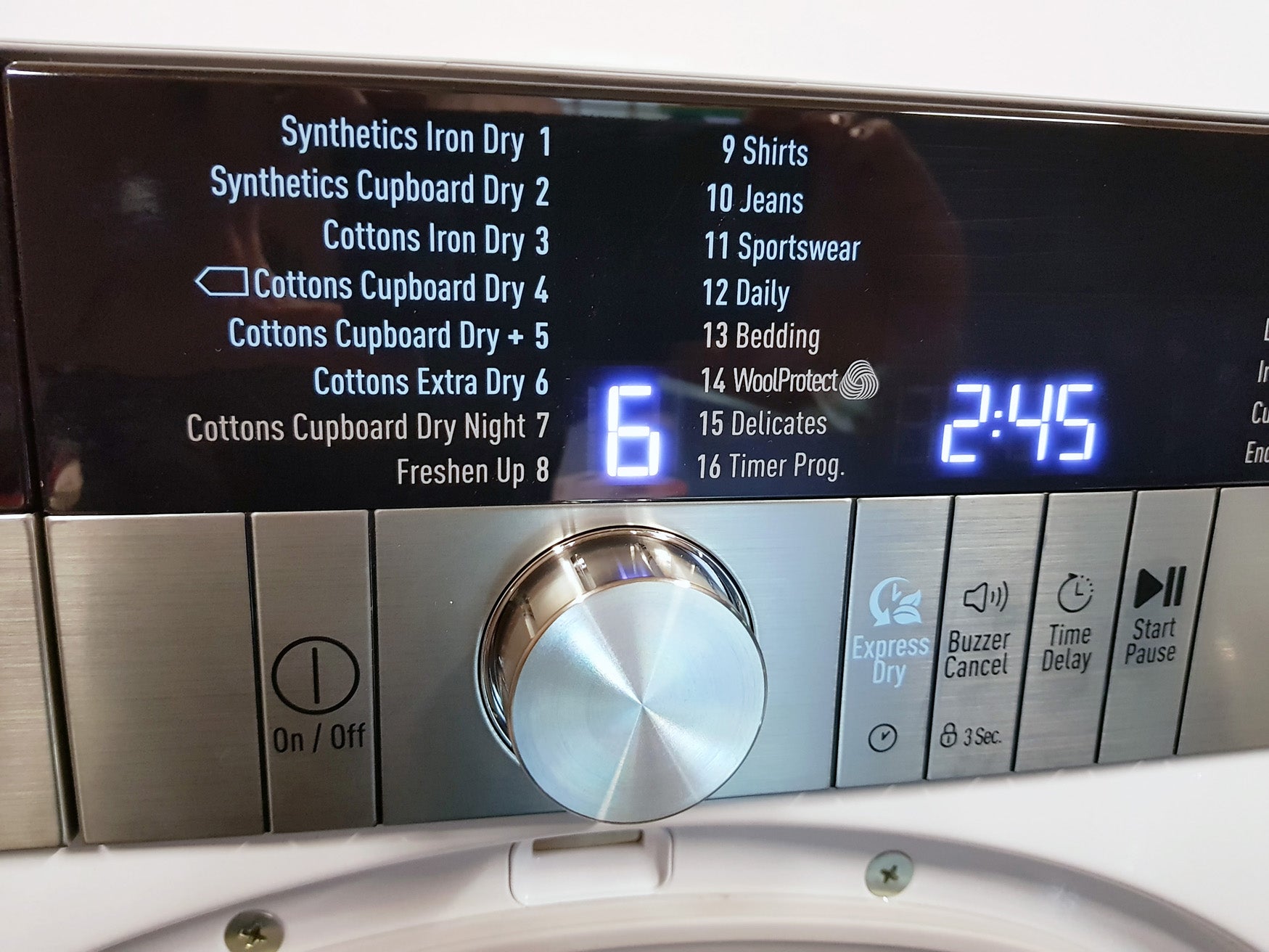Grundig dryer control panel with program options and timer display
