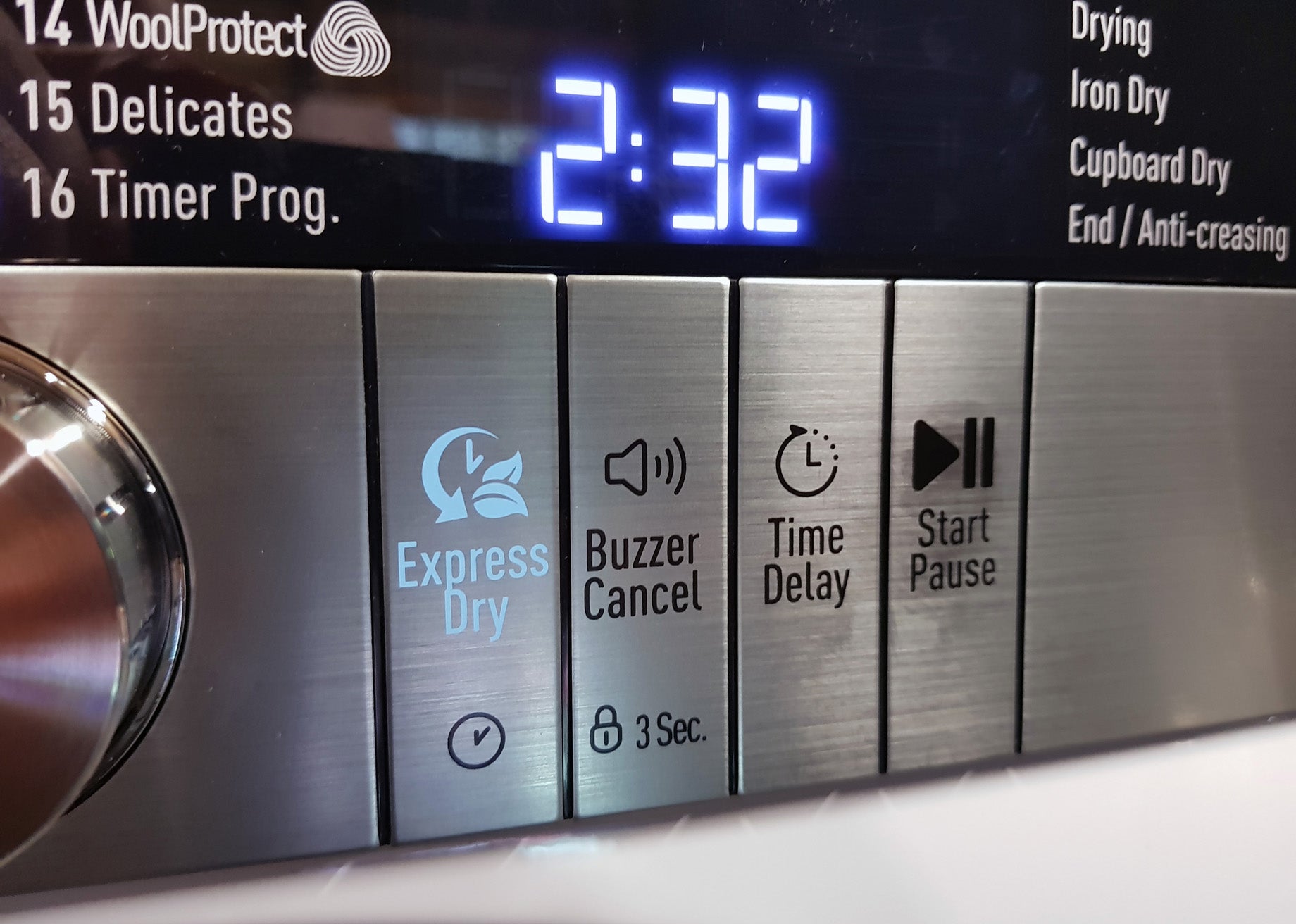 Grundig dryer control panel showing Express Dry and other options.