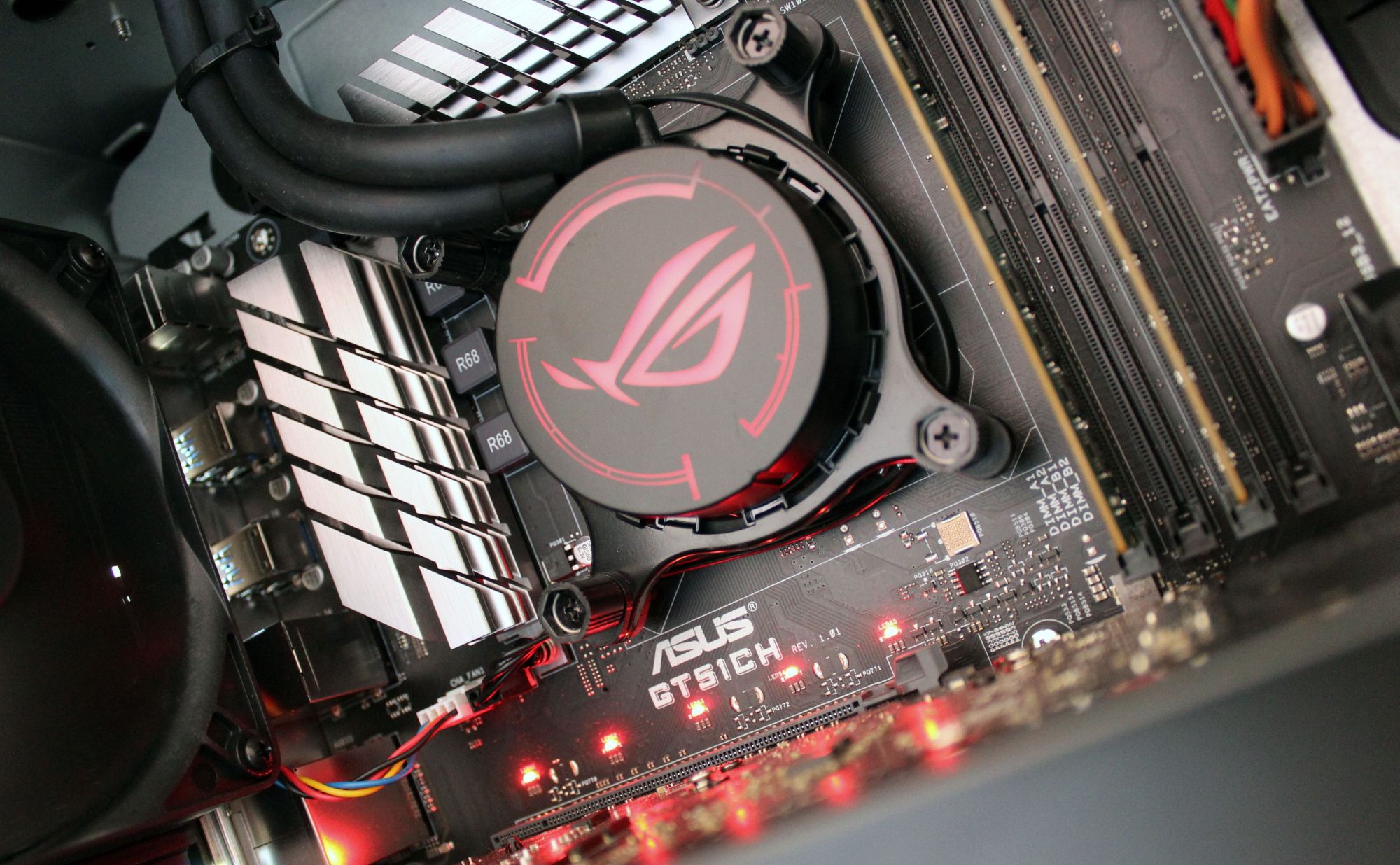 Asus ROG GT51CH motherboard and cooling system close-up.