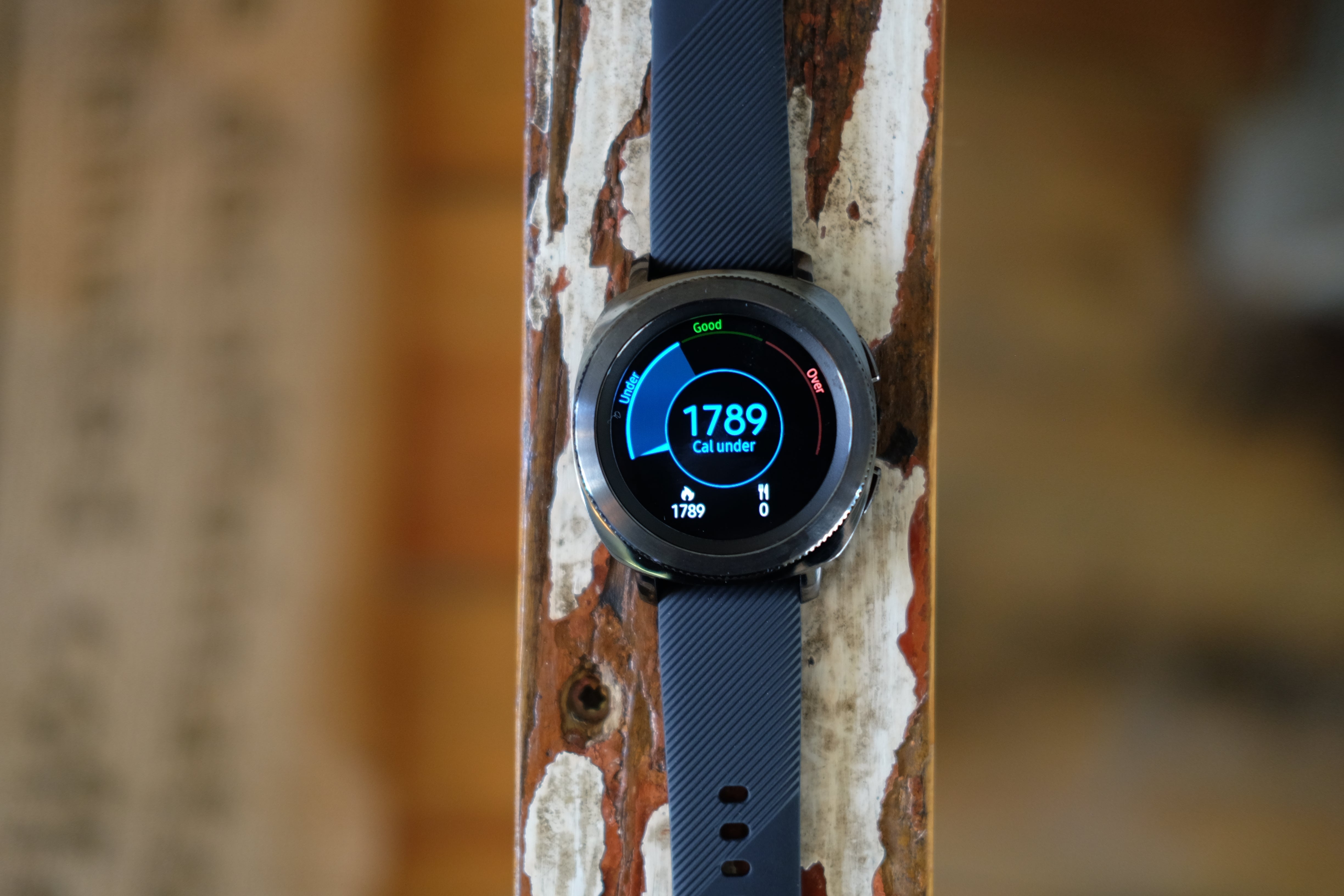 Samsung Gear Sport smartwatch displaying calorie count.