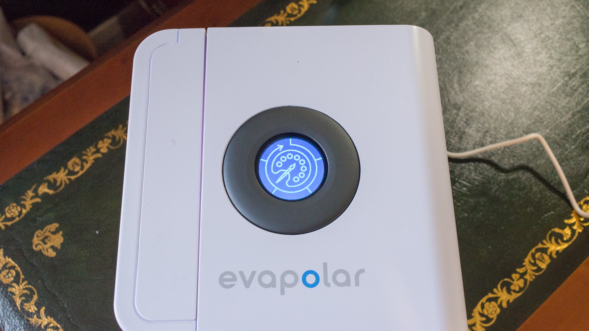 Evapolar Personal Air Cooler on a table with illuminated control.