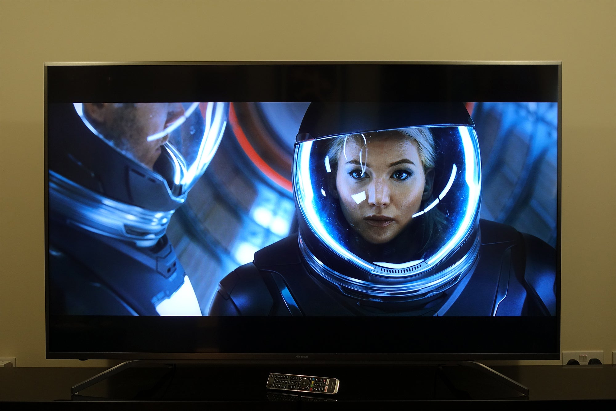 Hisense H70NU9700 TV displaying a high-definition movie scene.