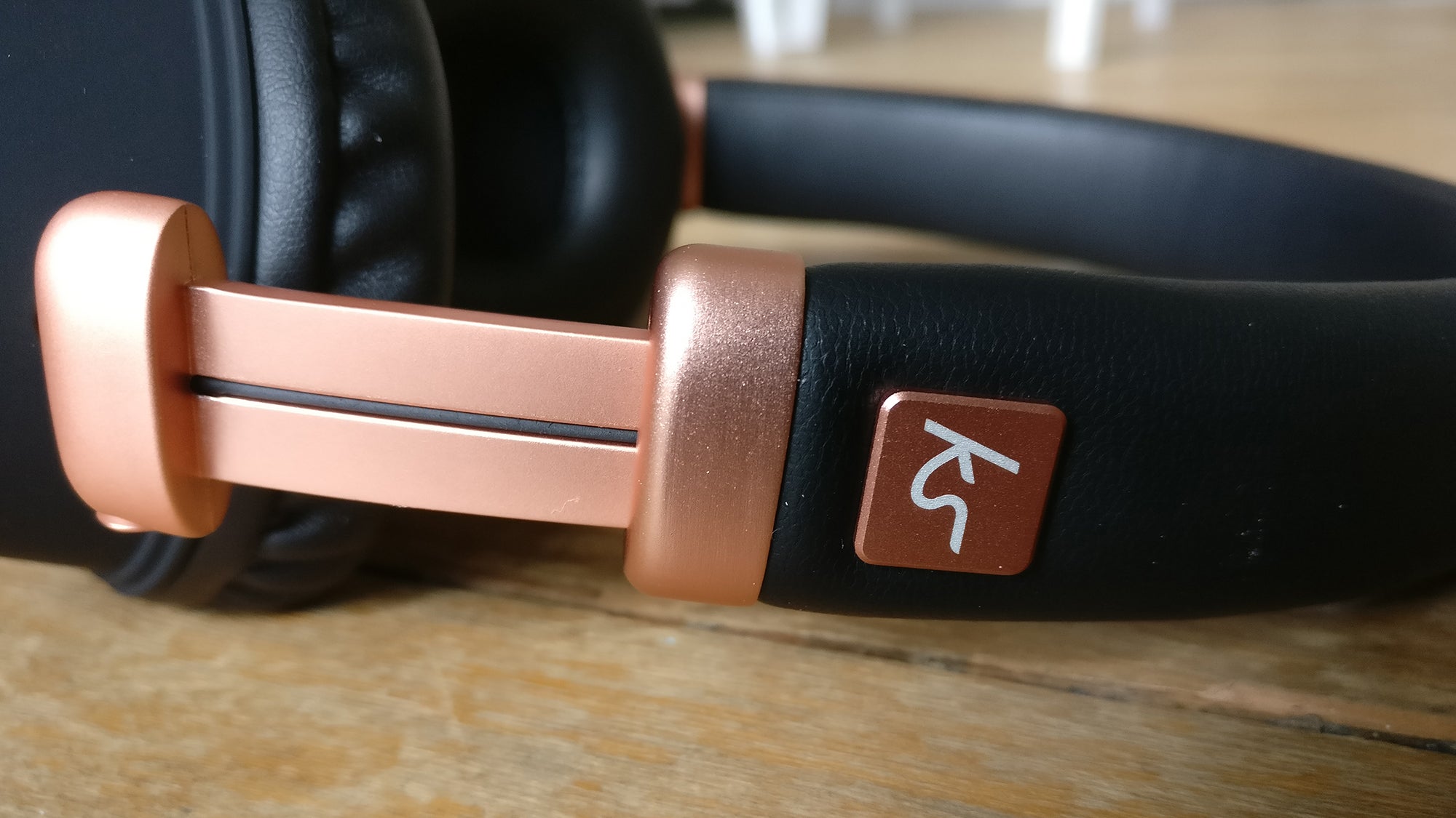 Close-up of KitSound Harlem Wireless Headphones hinge detail.