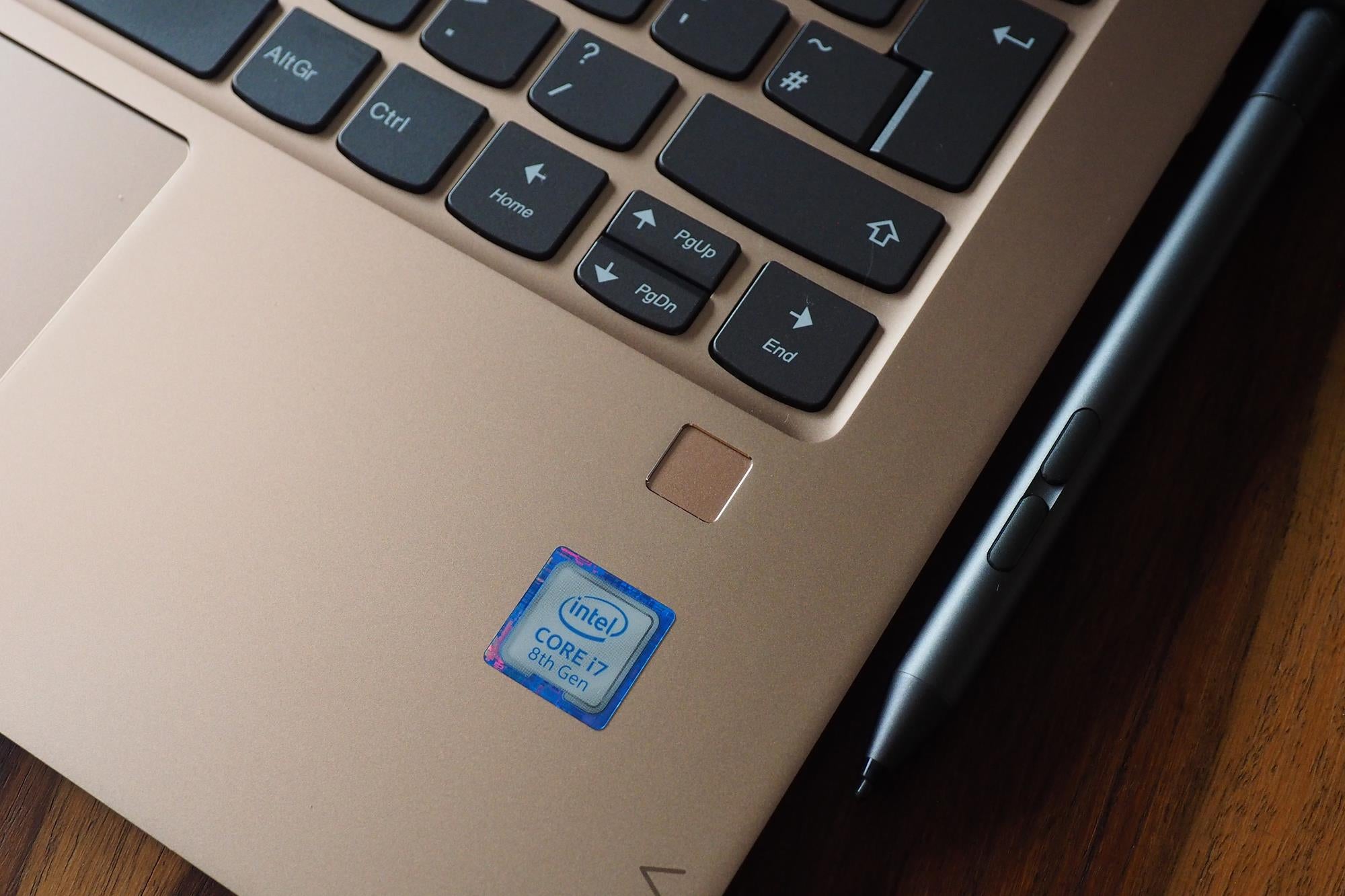 Lenovo Yoga 920 laptop with Intel Core i7 sticker and stylus.