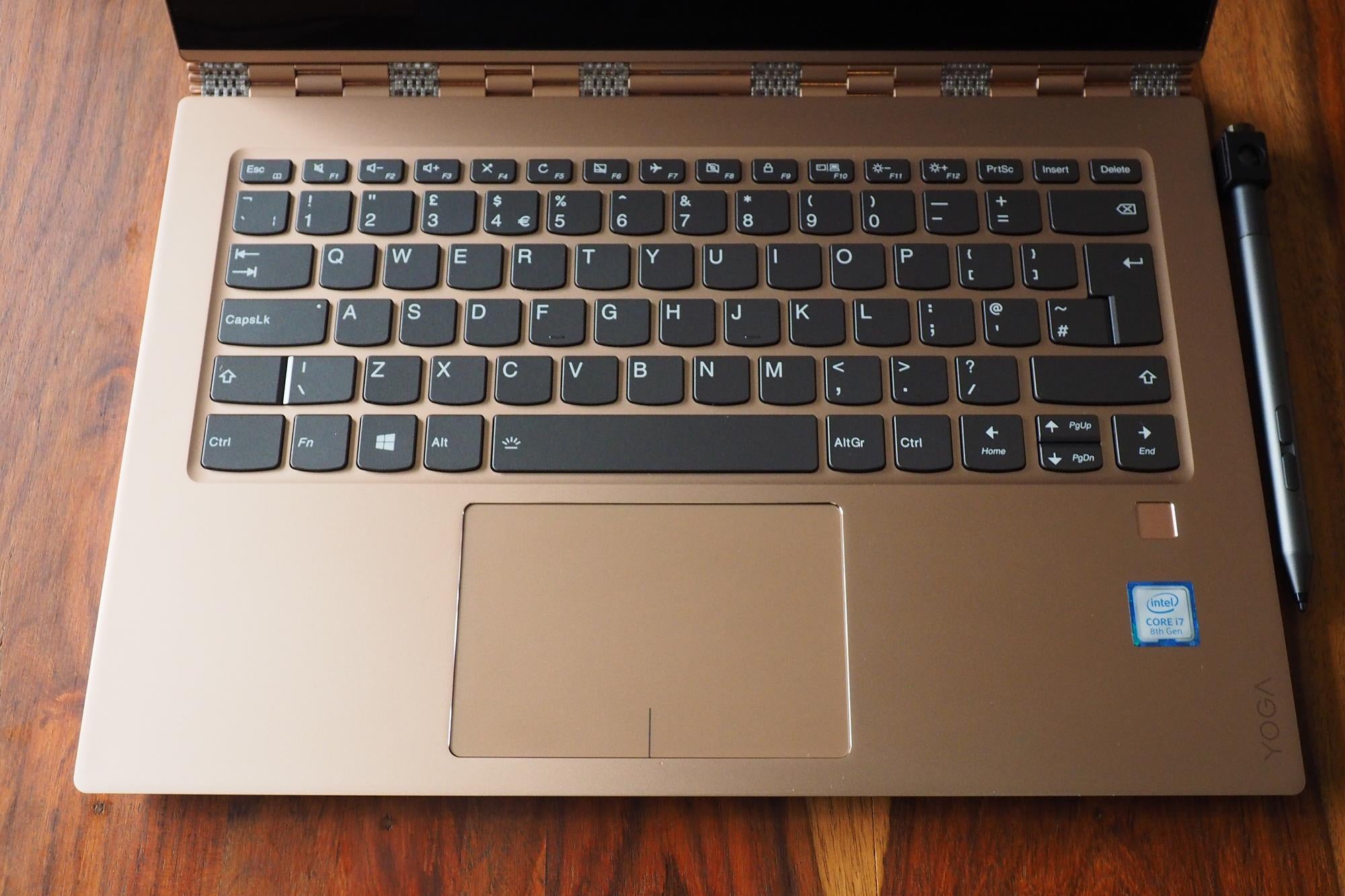 Lenovo Yoga 920 laptop with keyboard and screen visibleLenovo Yoga 920 laptop keyboard and touchpad close-up