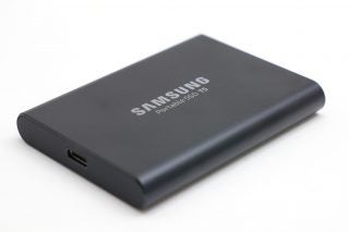 Samsung T5 portable SSD on a white background.