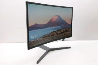 Samsung CHG70 curved gaming monitor on a desk.
