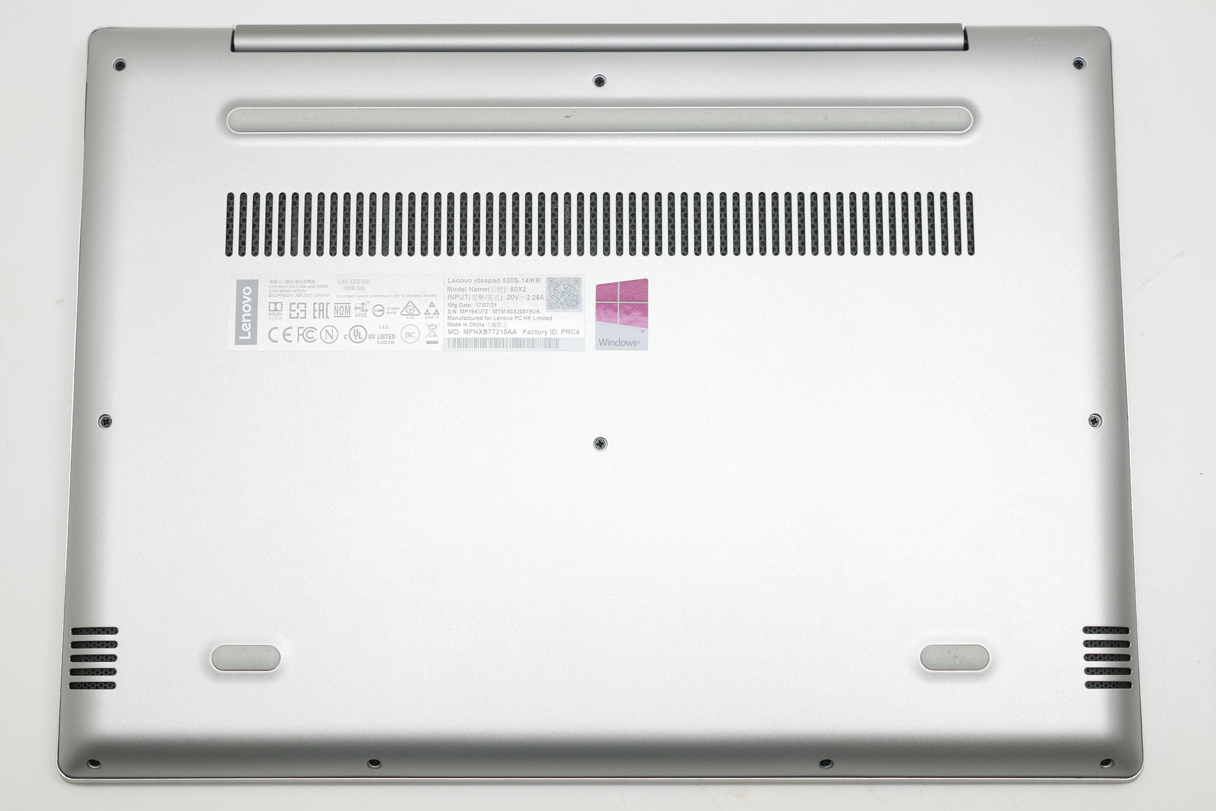 Lenovo IdeaPad 520S laptop underside with product labels
