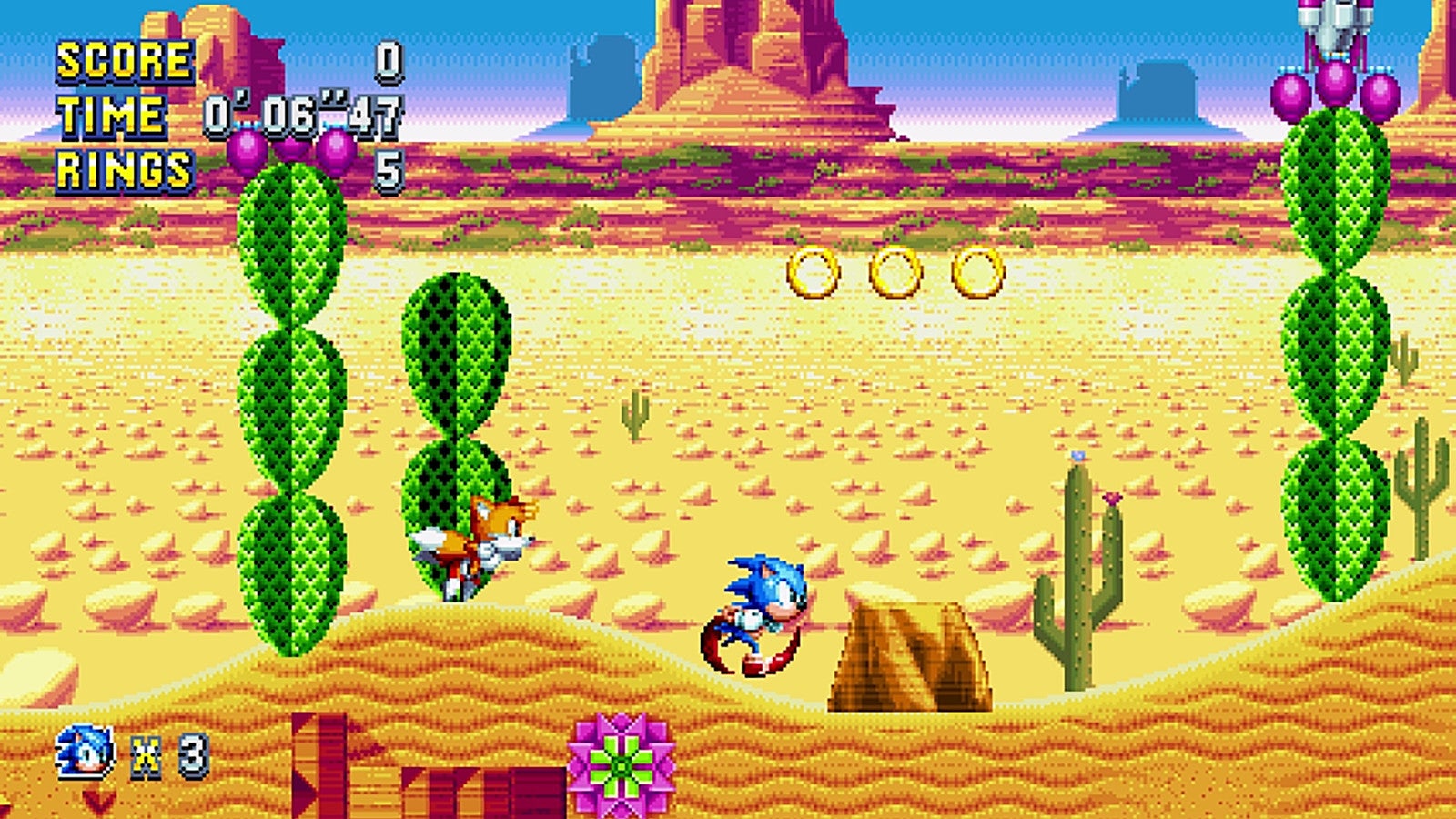 Sonic and Tails in desert level of Sonic Mania game.