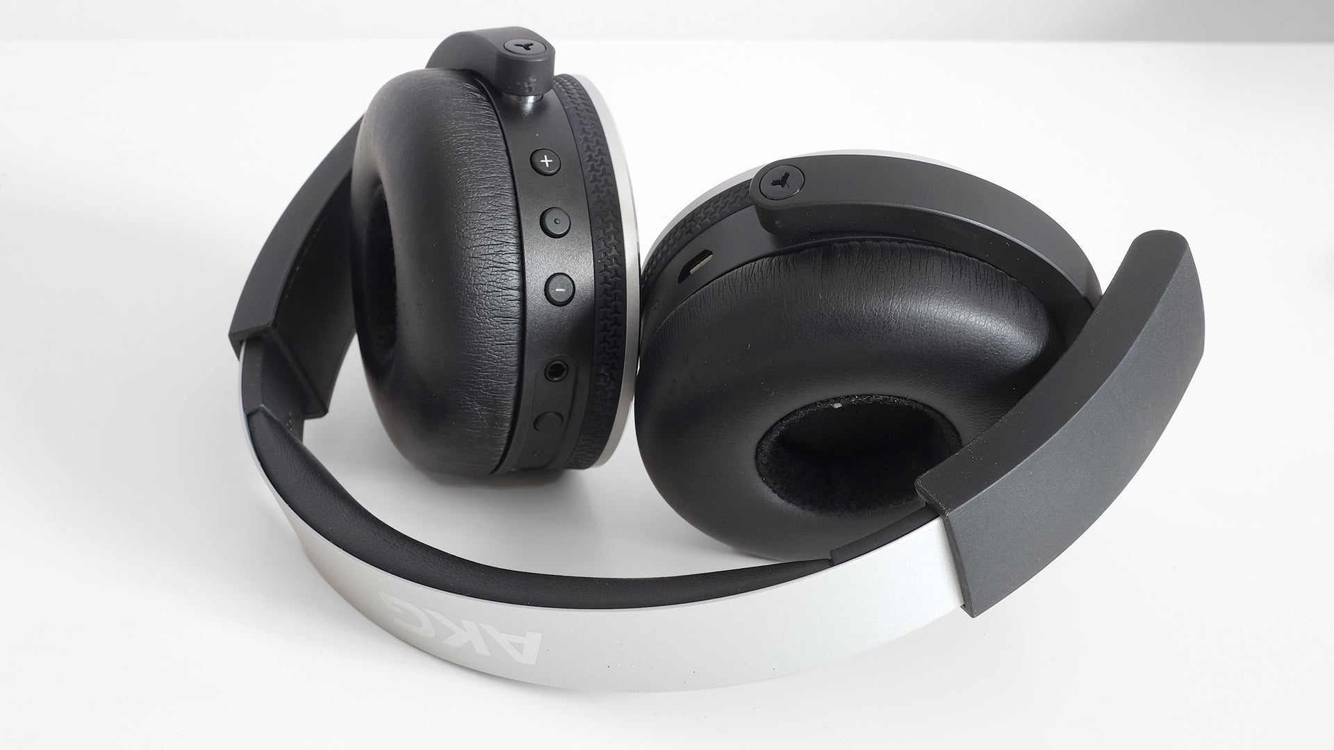 Black AKG Y50BT wireless headphones on white background.AKG Y50BT on-ear wireless headphones on white background.