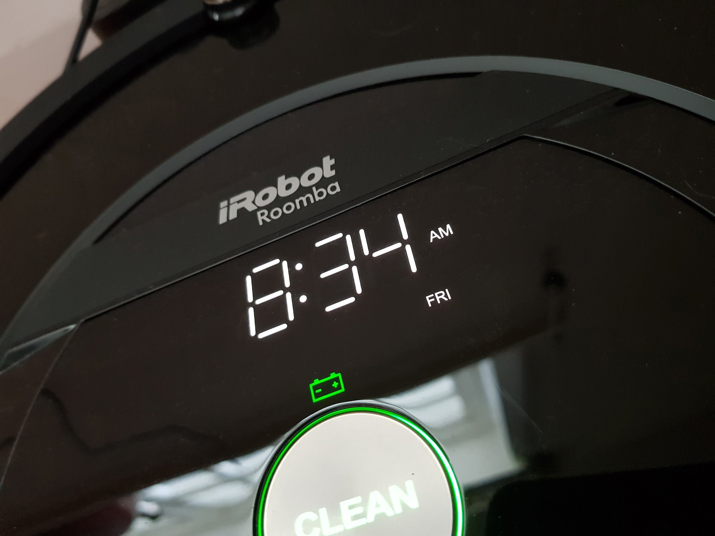iRobot Roomba 875 display showing time and clean button.
