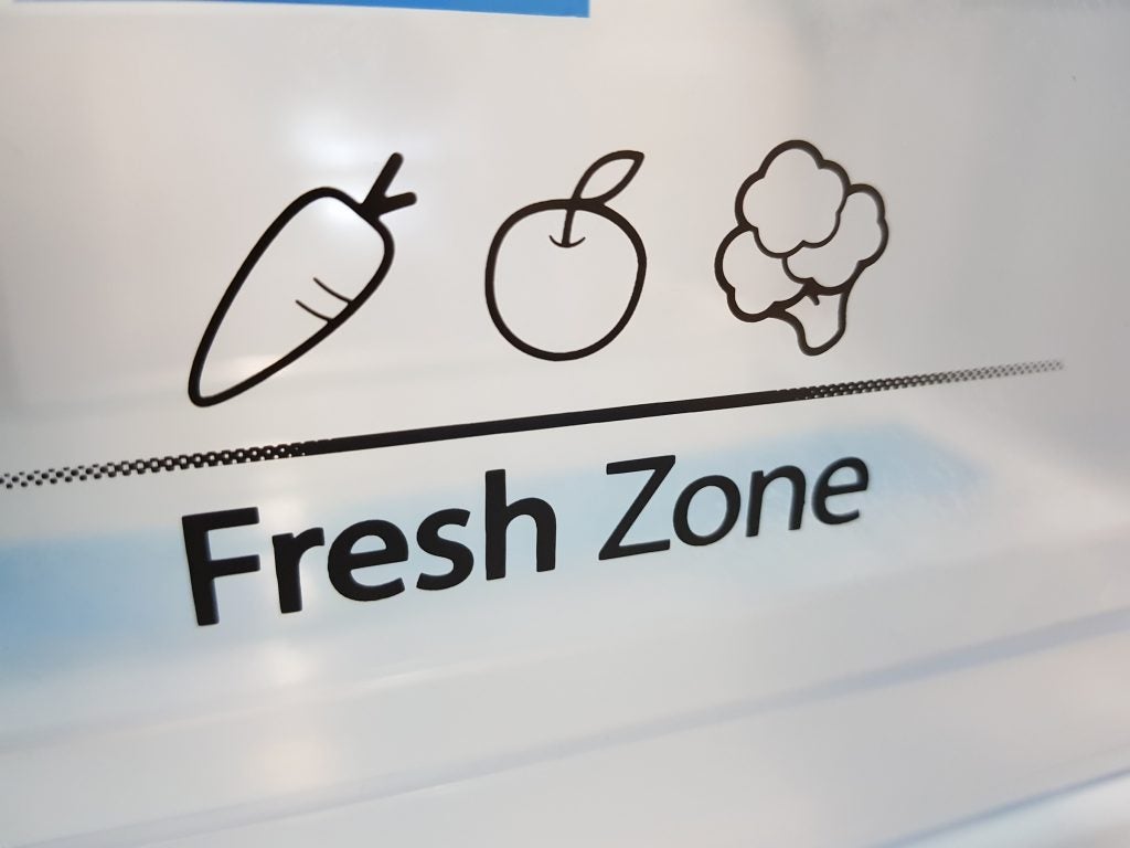Close-up of the Fresh Zone compartment in a Hisense fridge.