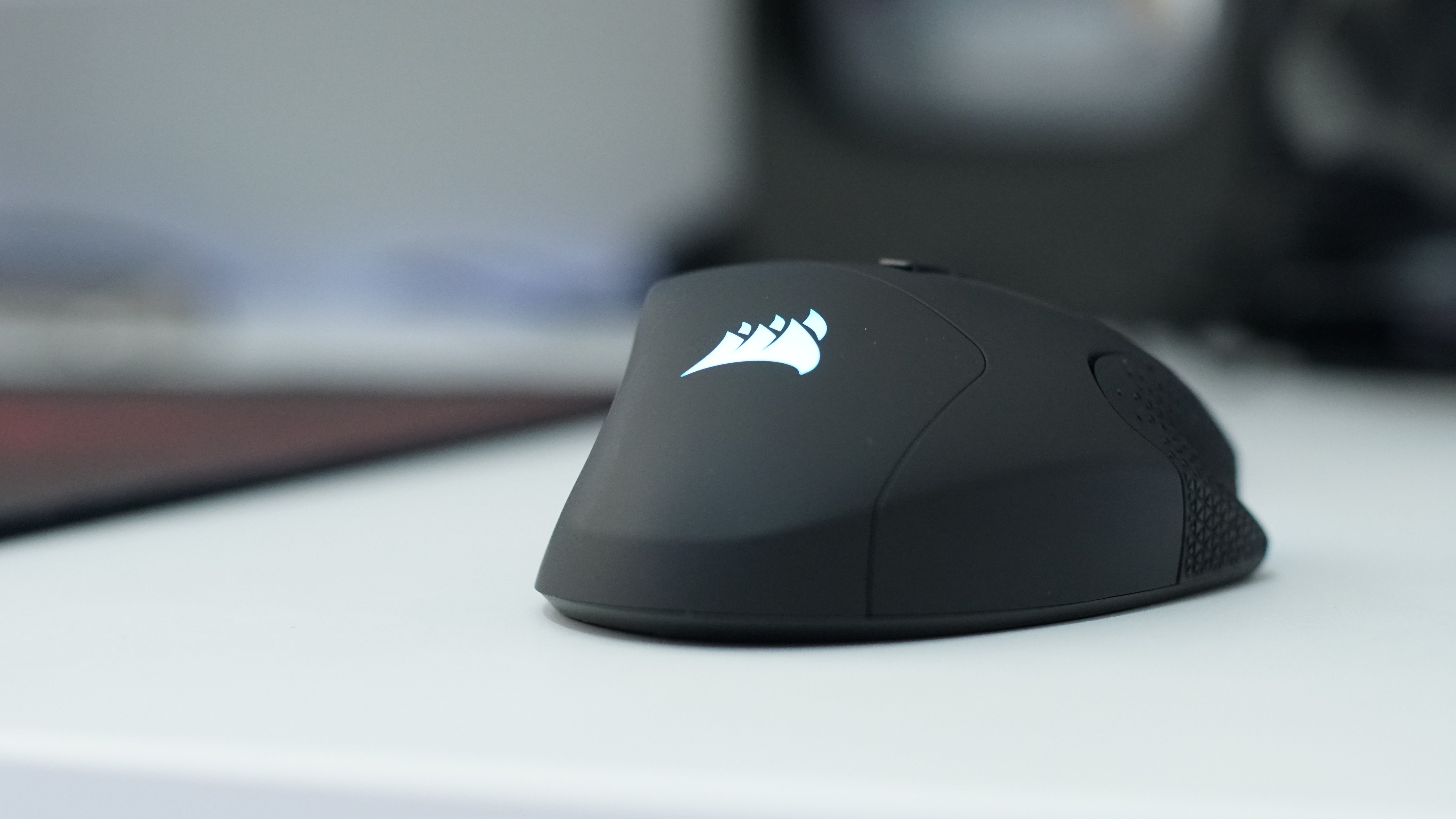 Corsair Scimitar Pro RGB gaming mouse on a desk