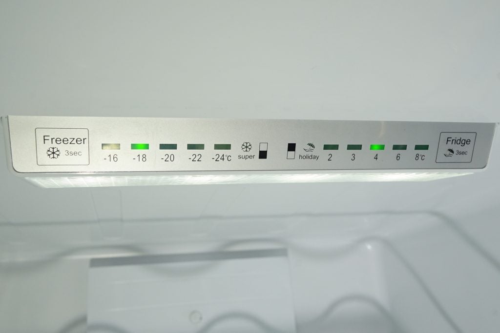 Hisense fridge control panel with temperature settings and indicators.