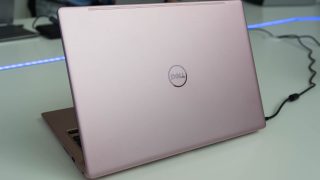Dell Inspiron 13 7000 laptop with closed lid on desk.