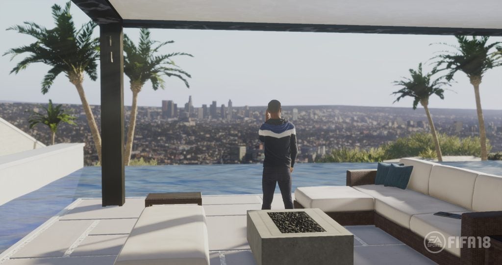 In-game screenshot of FIFA 18 showing city view from a balcony.