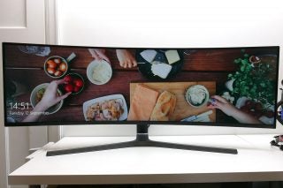 Samsung CHG90 monitor displaying ultra-wide food preparation scene.