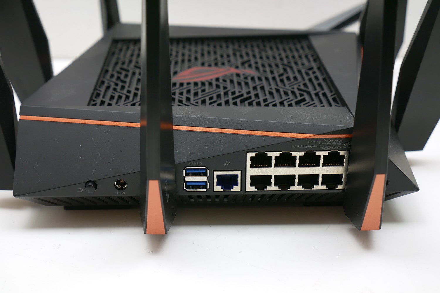 Asus ROG Rapture GT-AC5300 router with visible ports.