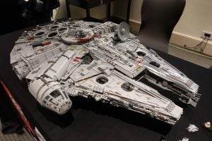 Lego UCS Millennium Falcon model displayed on a table.
