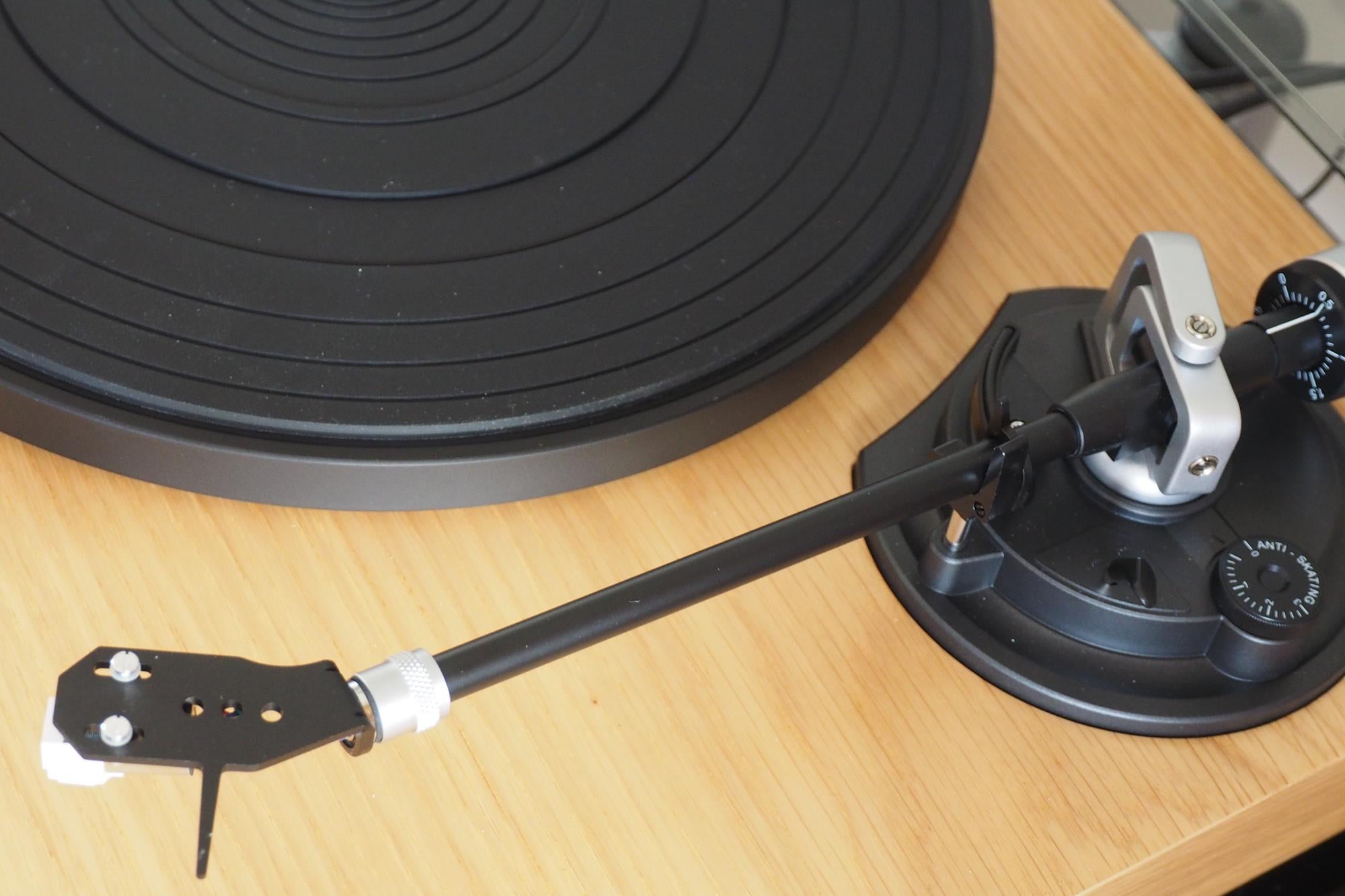 Close-up of Roberts Radio RT100 turntable on a wooden surface