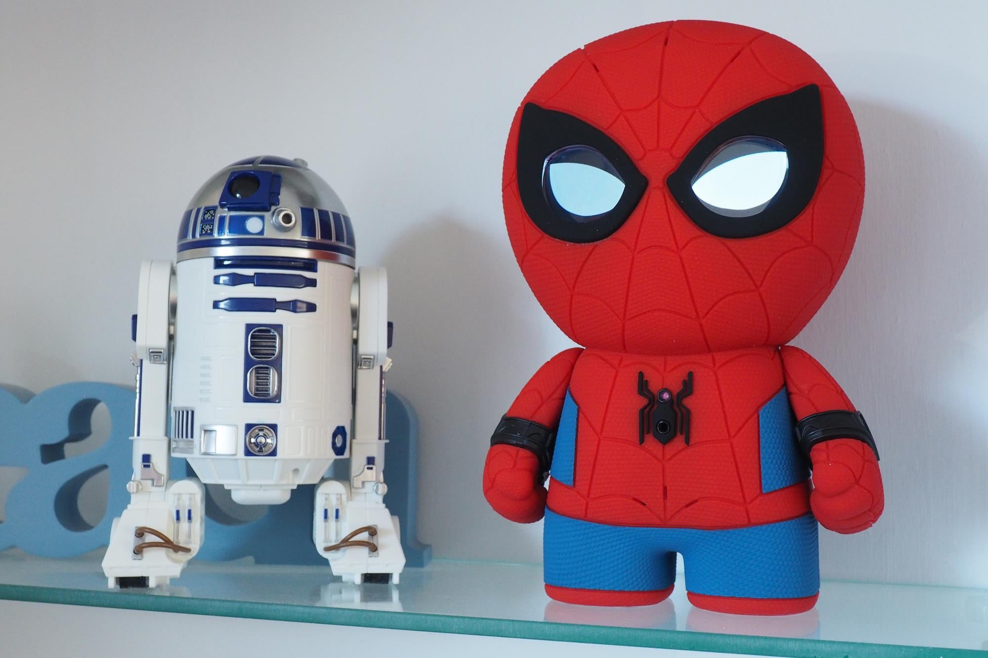 Sphero Spider-Man alongside R2-D2 toy on a shelf.