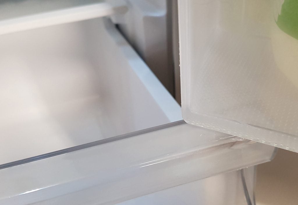 Close-up of Samsung fridge freezer shelf with visible wear