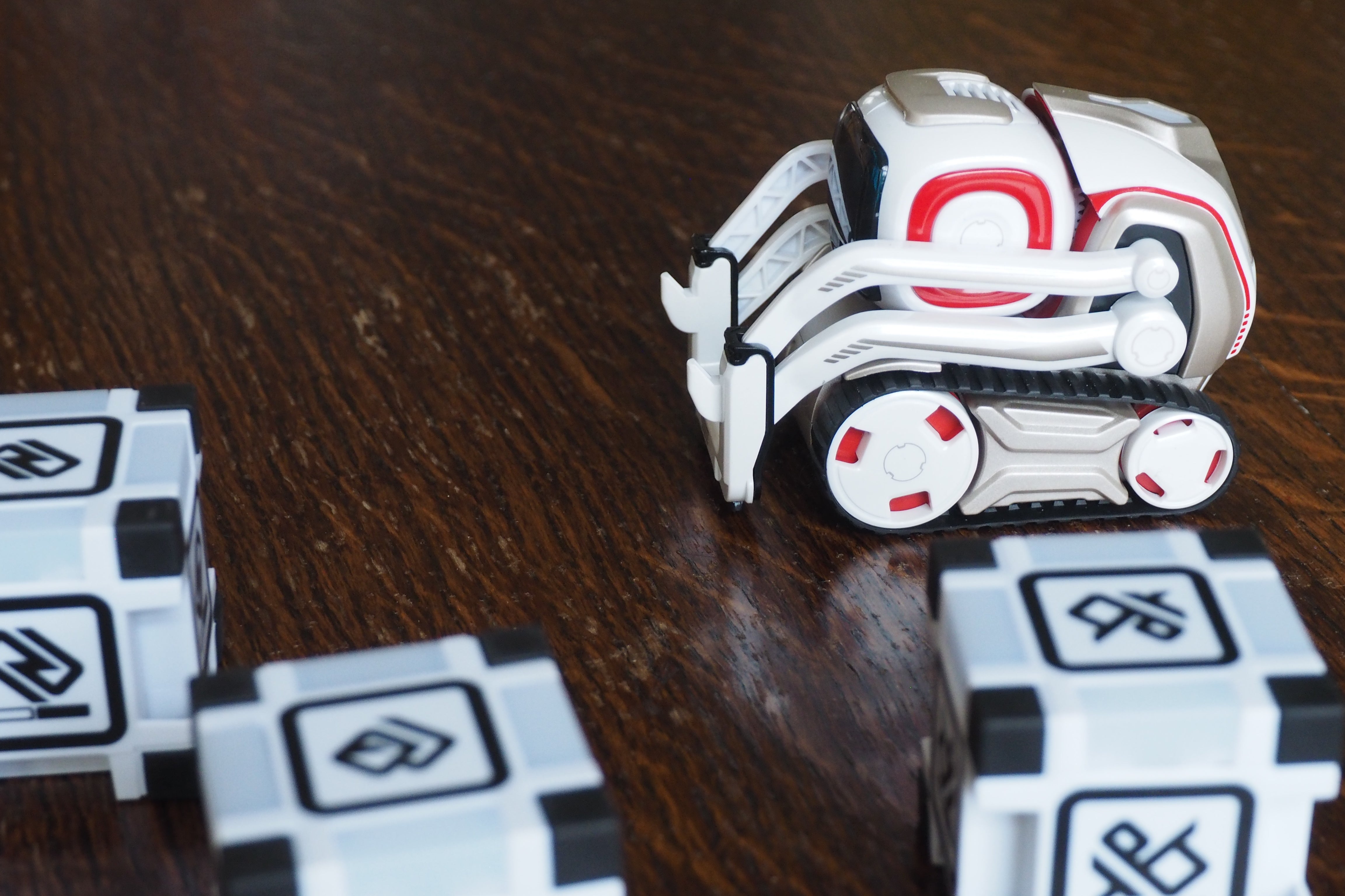 Anki Cozmo robot with interactive Power Cubes on a table.