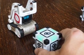 Anki Cozmo robot interacting with coded cubes.