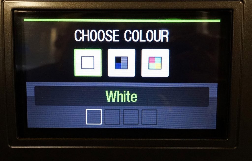 Washing machine display showing color selection options.