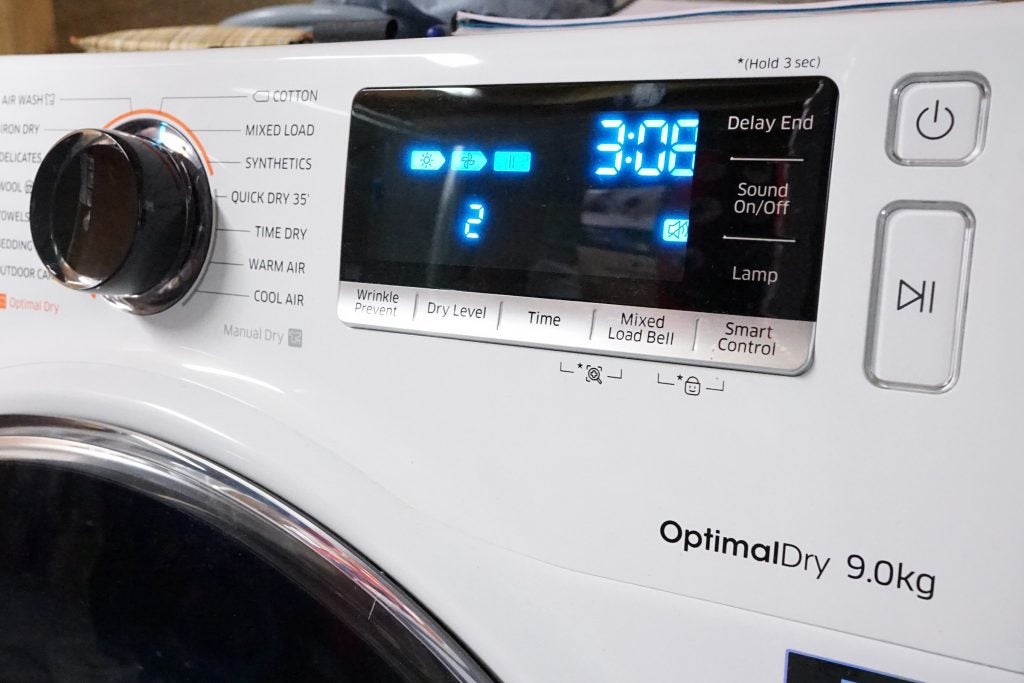 Samsung dryer control panel displaying settings and time.
