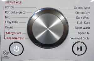 LG washing machine control panel with cycle options.