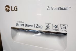 Close-up of LG washing machine features including Inverter Direct Drive.