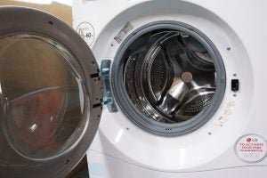 LG Centum FH6F9BDS2 washing machine with open door.