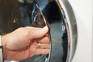 Hand opening door of LG Centum washing machine.