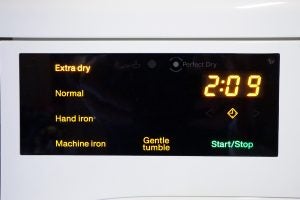 Miele TDB120WP dryer display showing drying options and time.