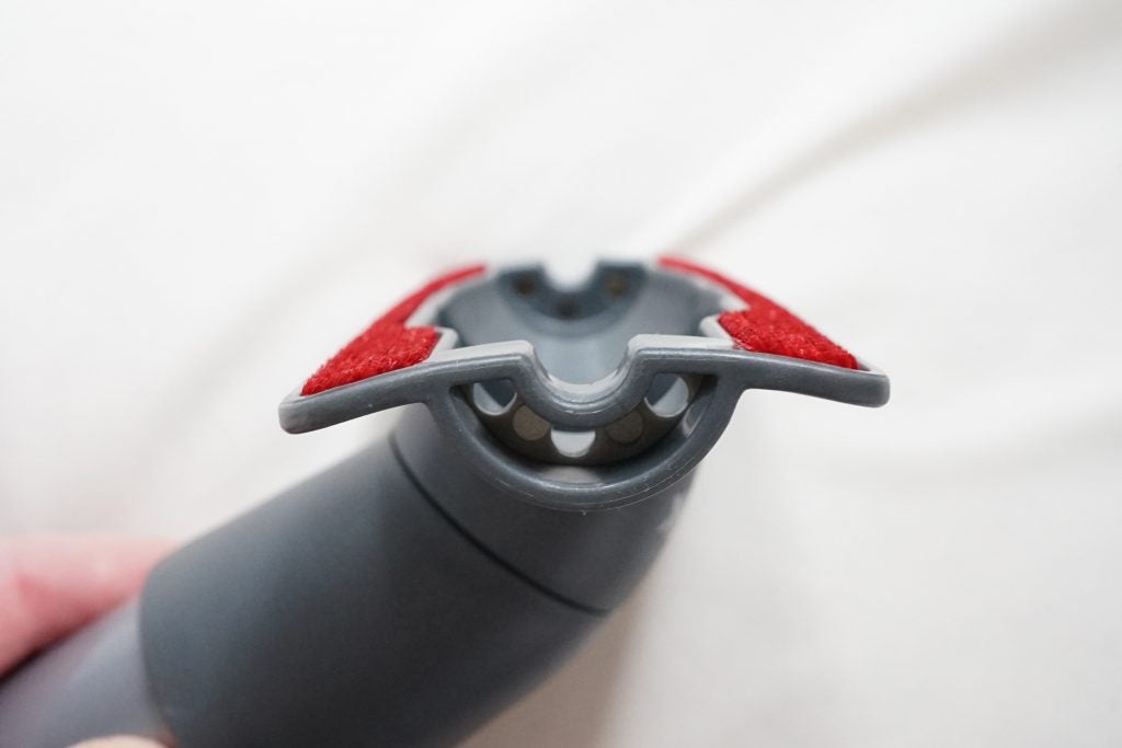 Close-up of Shark vacuum cleaner's handheld upholstery tool.