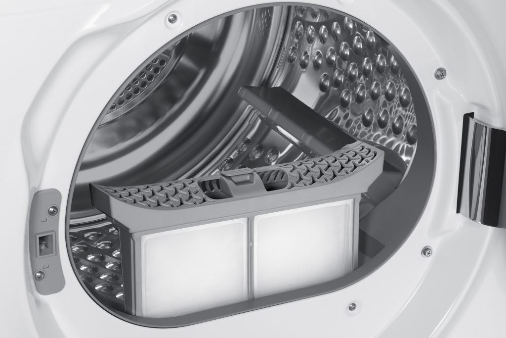 Samsung DV90M8204AW heat pump tumble dryer interior.