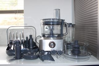 Kenwood Multipro Sense FPM810 food processor with attachments.
