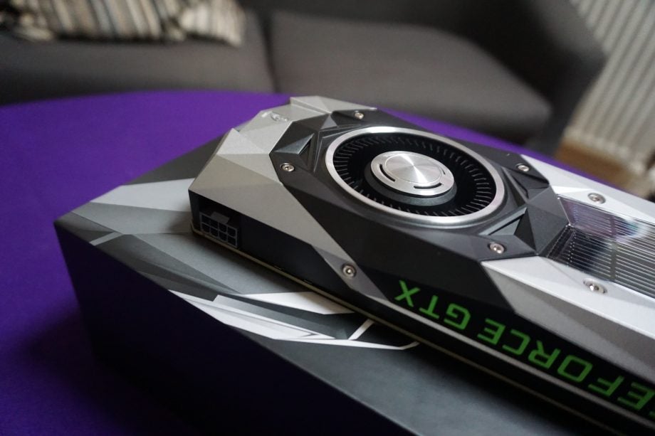 Nvidia GeForce GTX 1070 Ti graphics card on purple background.