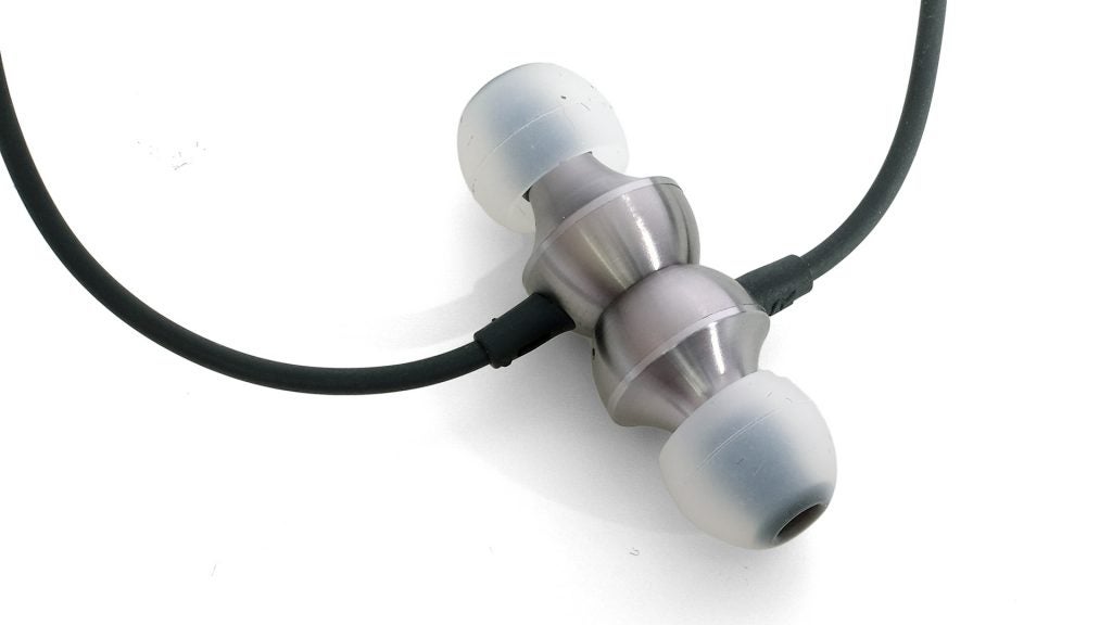 RHA MA650 wireless earbuds with black cable and silver body.