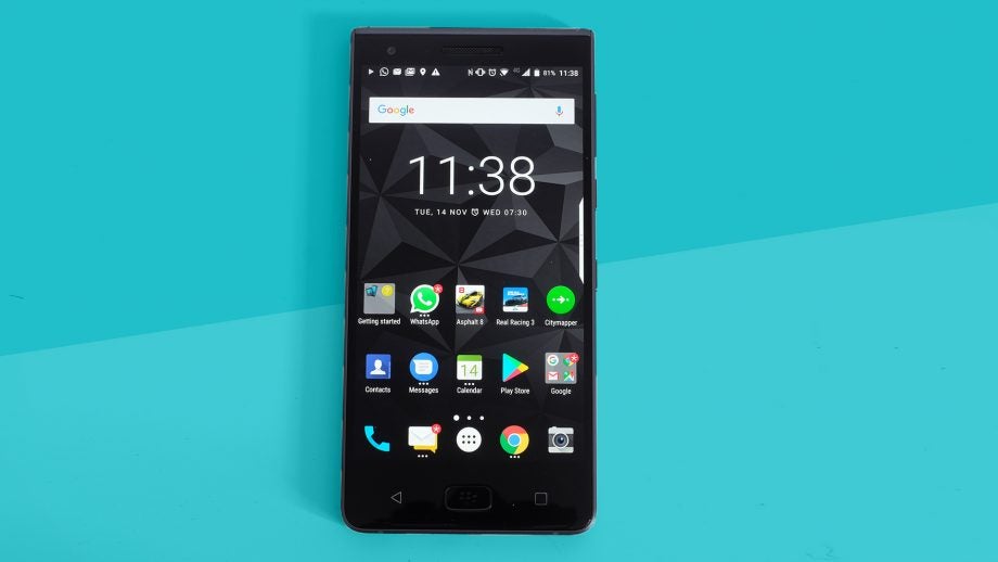 BlackBerry Motion smartphone displaying apps on screen.